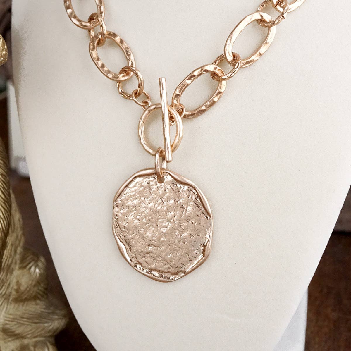 Nomad Glow – Front Toggle Statement Necklace with Hammered Disc: Worn Silver Tone