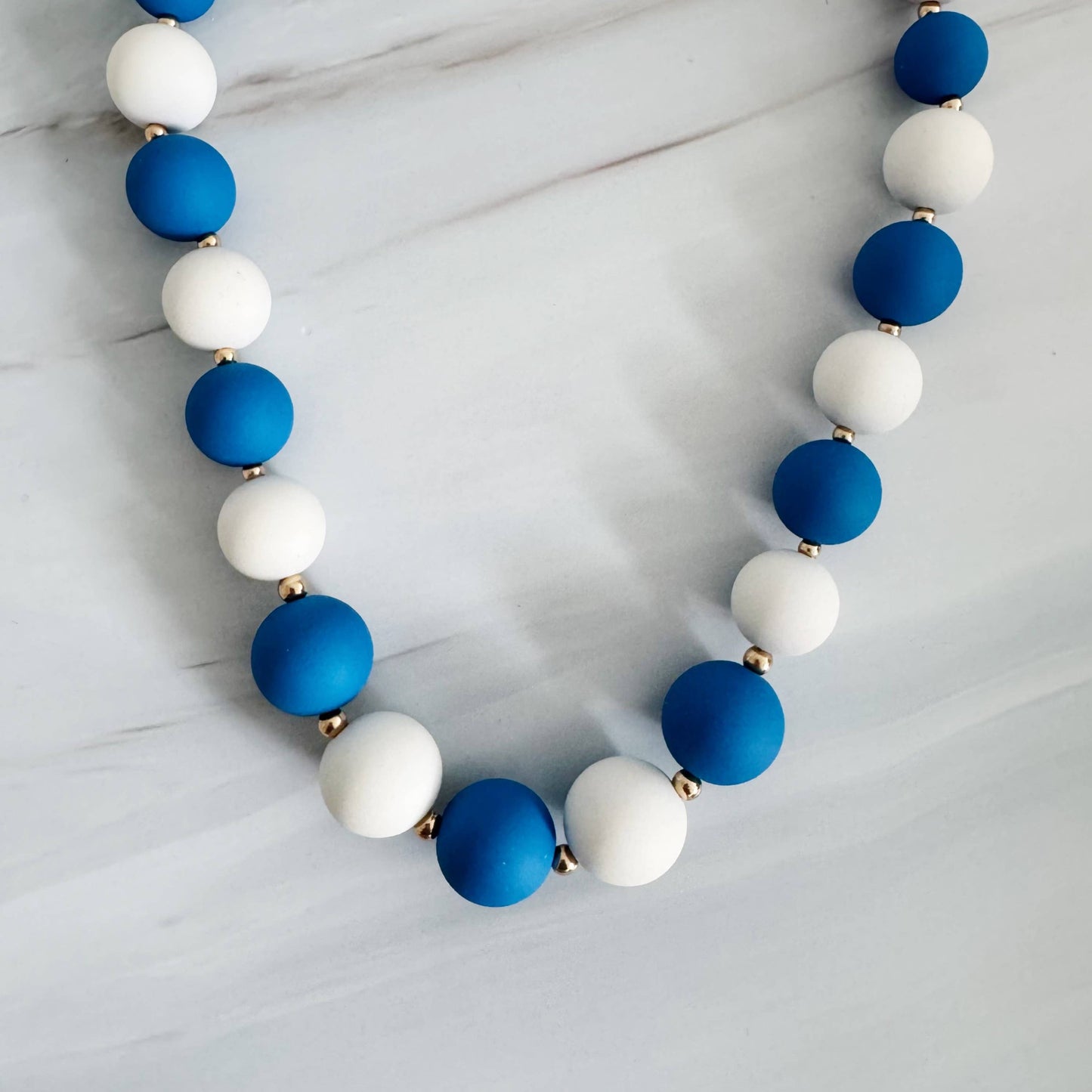 Champion Of The Game Ball Bead Necklace: Red/Black