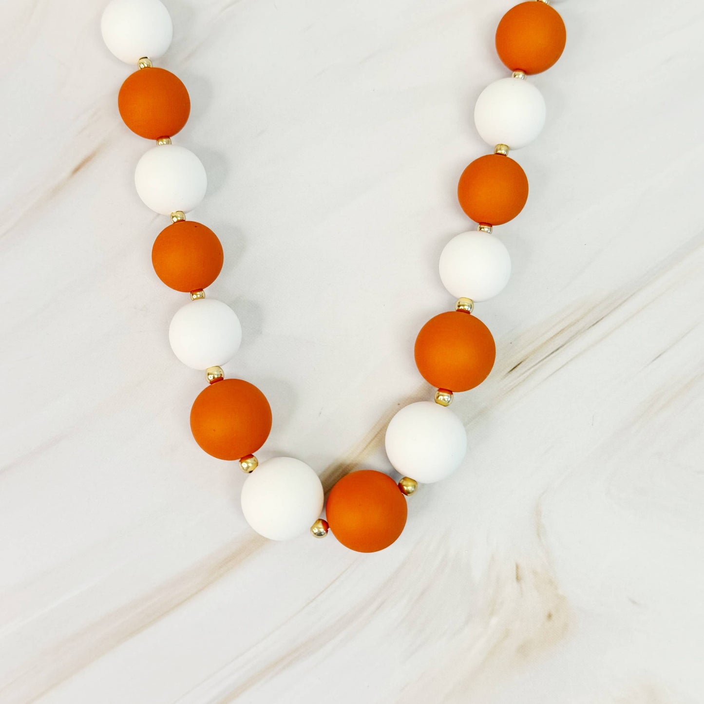 Champion Of The Game Ball Bead Necklace: Orange/White