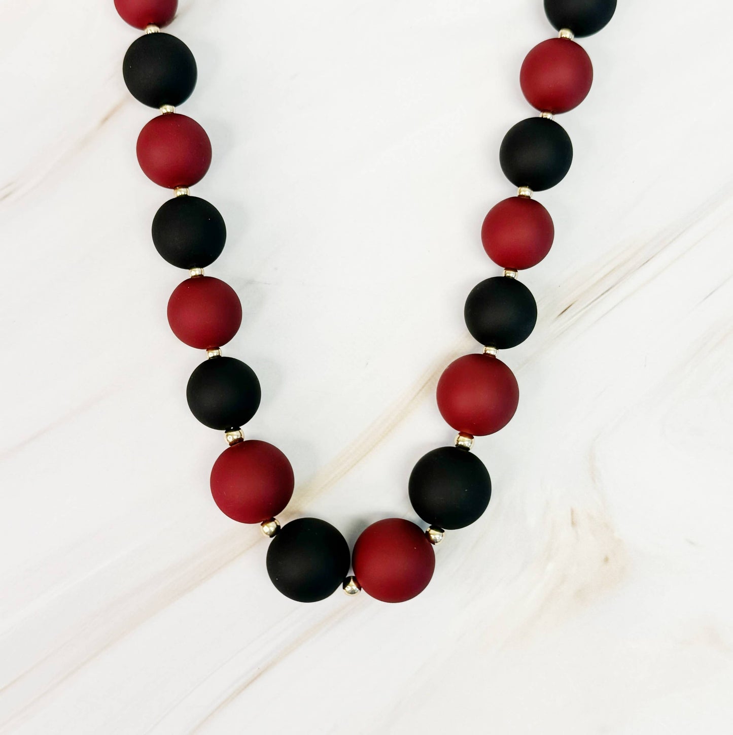 Champion Of The Game Ball Bead Necklace: Red/Black