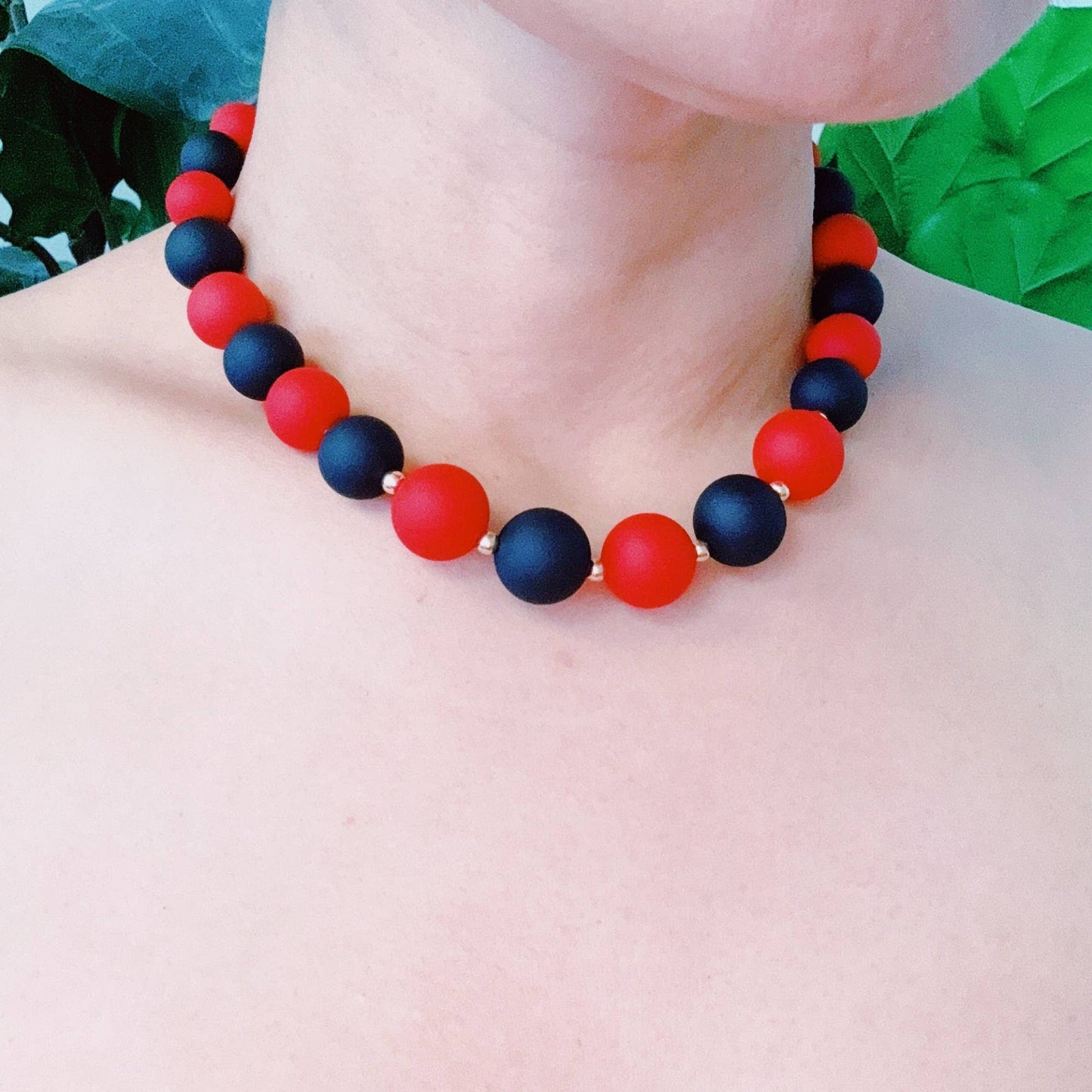 Champion Of The Game Ball Bead Necklace: Red/Black